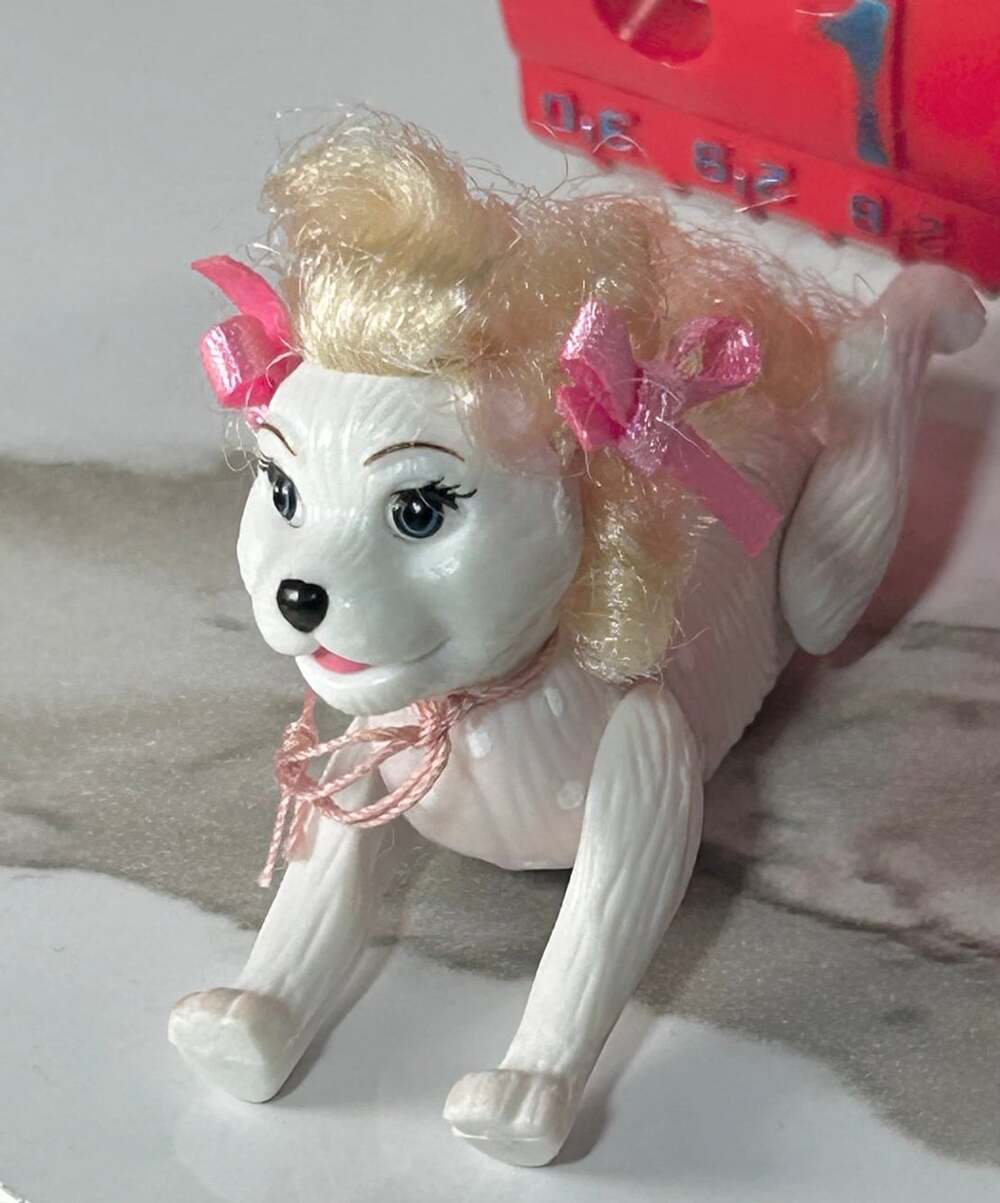 Barbie or Polly pocket poodle not sure which this is !